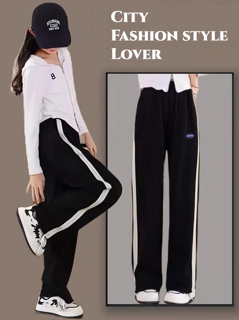 女黑色运动裤穿衣搭配_运动个性吊带配黑裤，显瘦又时尚！